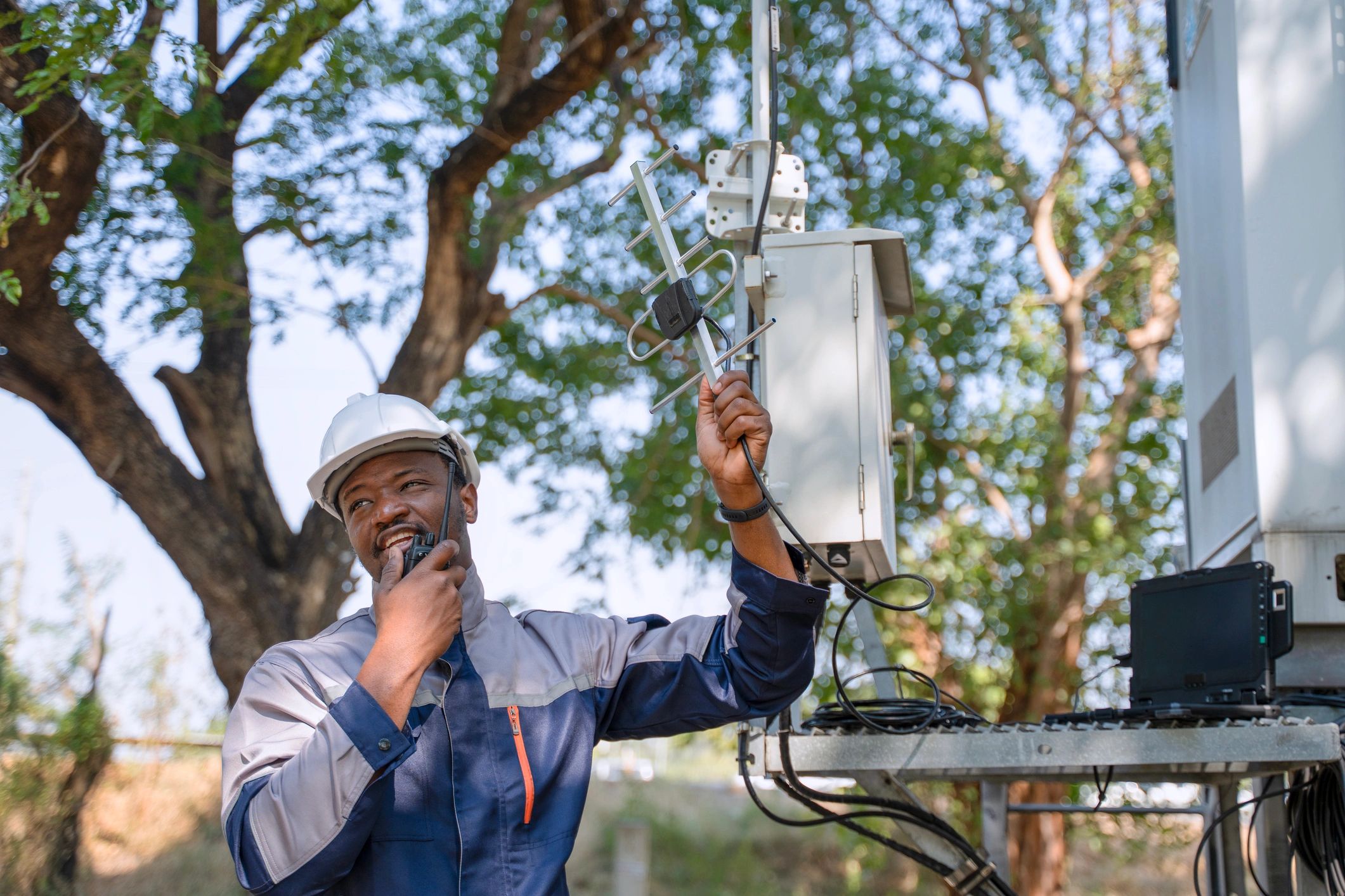 Network engineer inspecting communication and cabling systems