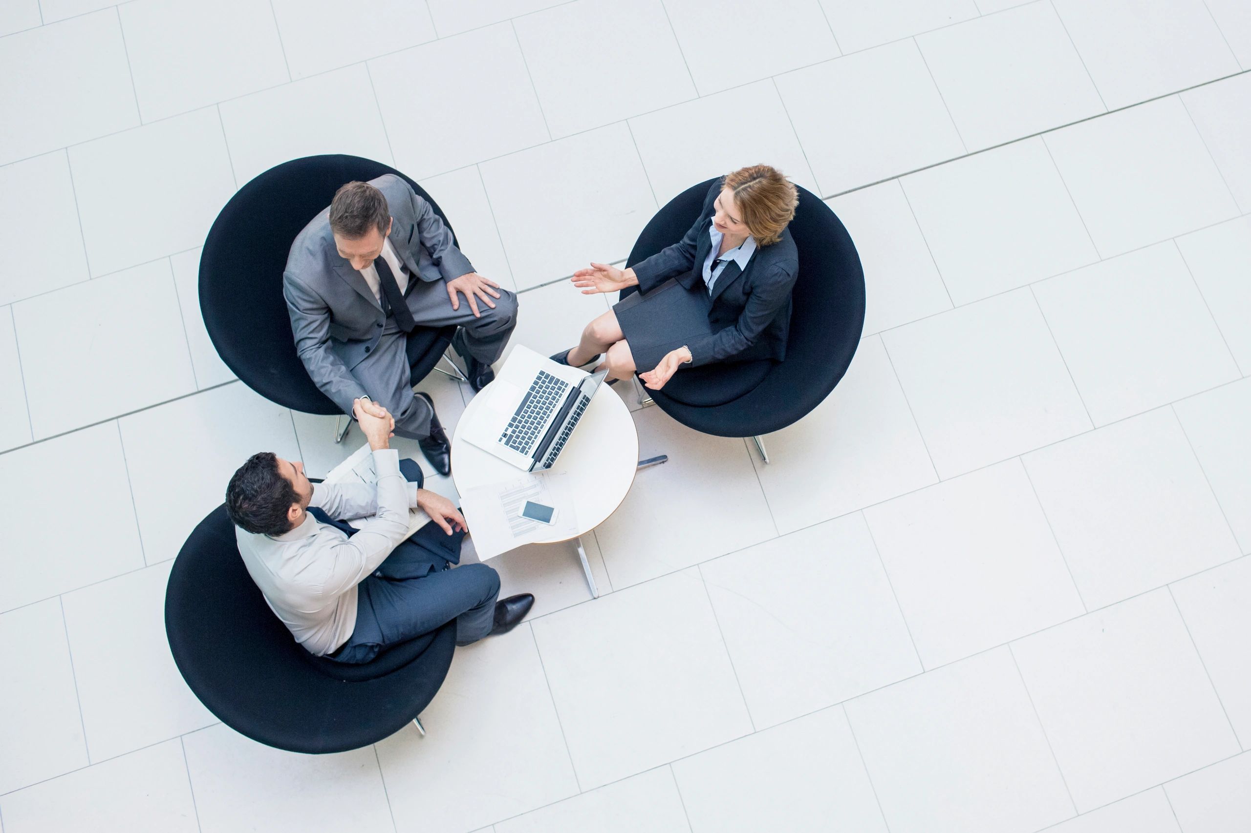 Business partners sealing a technology partnership agreement